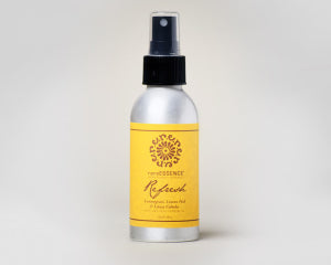 Silver spray bottle with yellow Refresh label