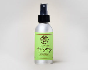 Silver spray bottle with lime green Uplifting label